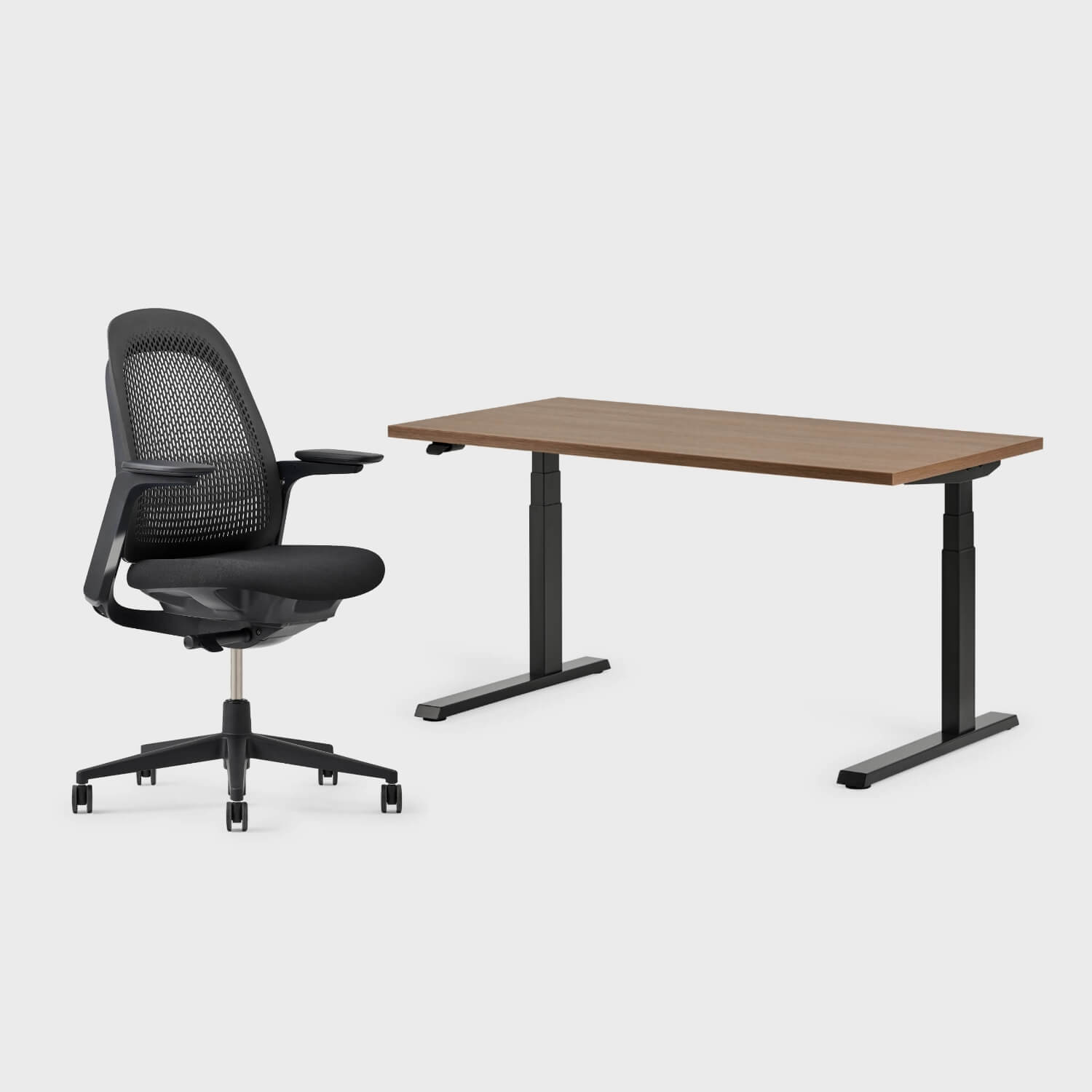 Breck office chair and Upside sit-to-stand desk set, ergonomic bundle for comfortable work in any posture.