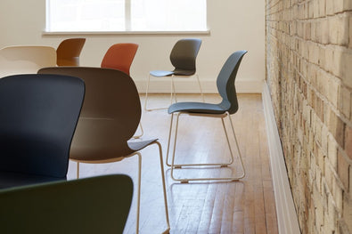 Maari Chair Sled Base with Upholstered Seat in lifestyle shot