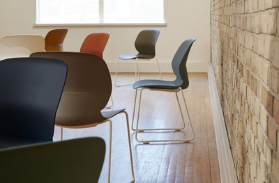 Maari Upholstered Chair with Sled Base in lifestyle shot