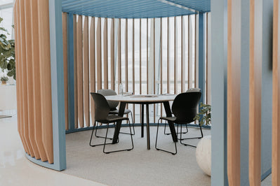 Maari Chair Sled Base with Upholstered Seat in lifestyle shot