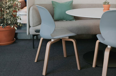 Maari Upholstered Chair with Wood Base in lifestyle shot