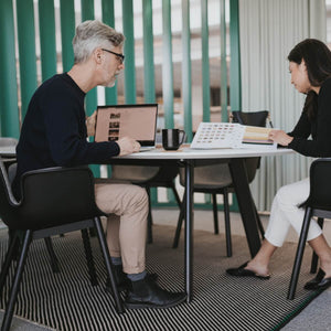 Immerse Round Table in lifestyle shot