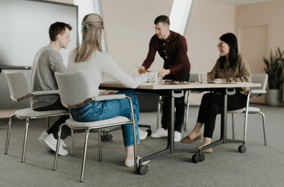 Jive T-Base Flip Table in lifestyle shot