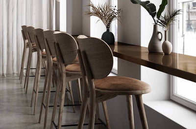 Mater High Stool with Backrest in lifestyle shot