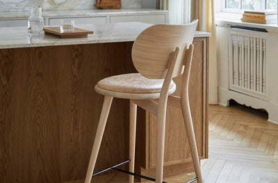 Mater High Stool with Backrest in lifestyle shot