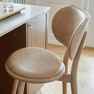 Mater High Stool with Backrest in lifestyle shot