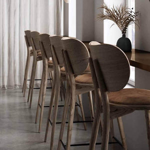 Mater High Stool with Backrest in lifestyle shot