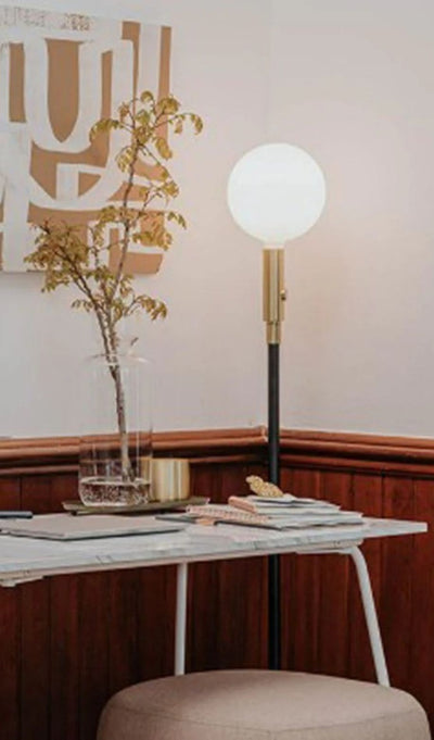 Poise Adjustable Floor Lamp in lifestyle shot