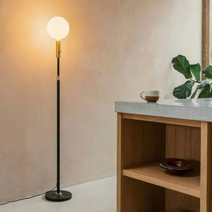 Poise Adjustable Floor Lamp in lifestyle shot