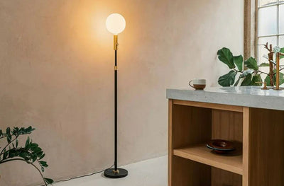 Poise Adjustable Floor Lamp in lifestyle shot
