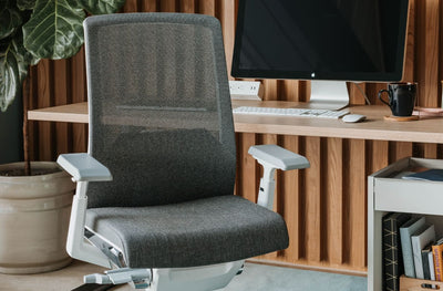 Very Black Leather Outlet Chair in lifestyle shot
