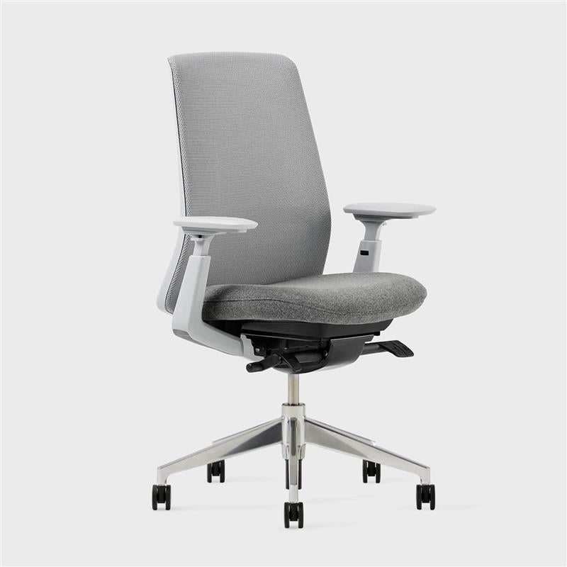 Soji Office Chair in grey mesh fabric with adjustable armrests and rolling base for ergonomic support.