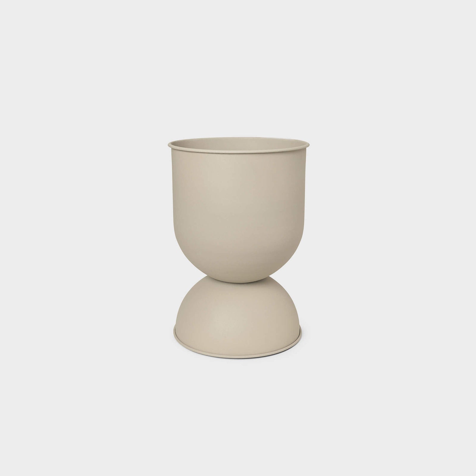 Hourglass Planter in matte beige finish, designed for versatile use indoors or outdoors.
