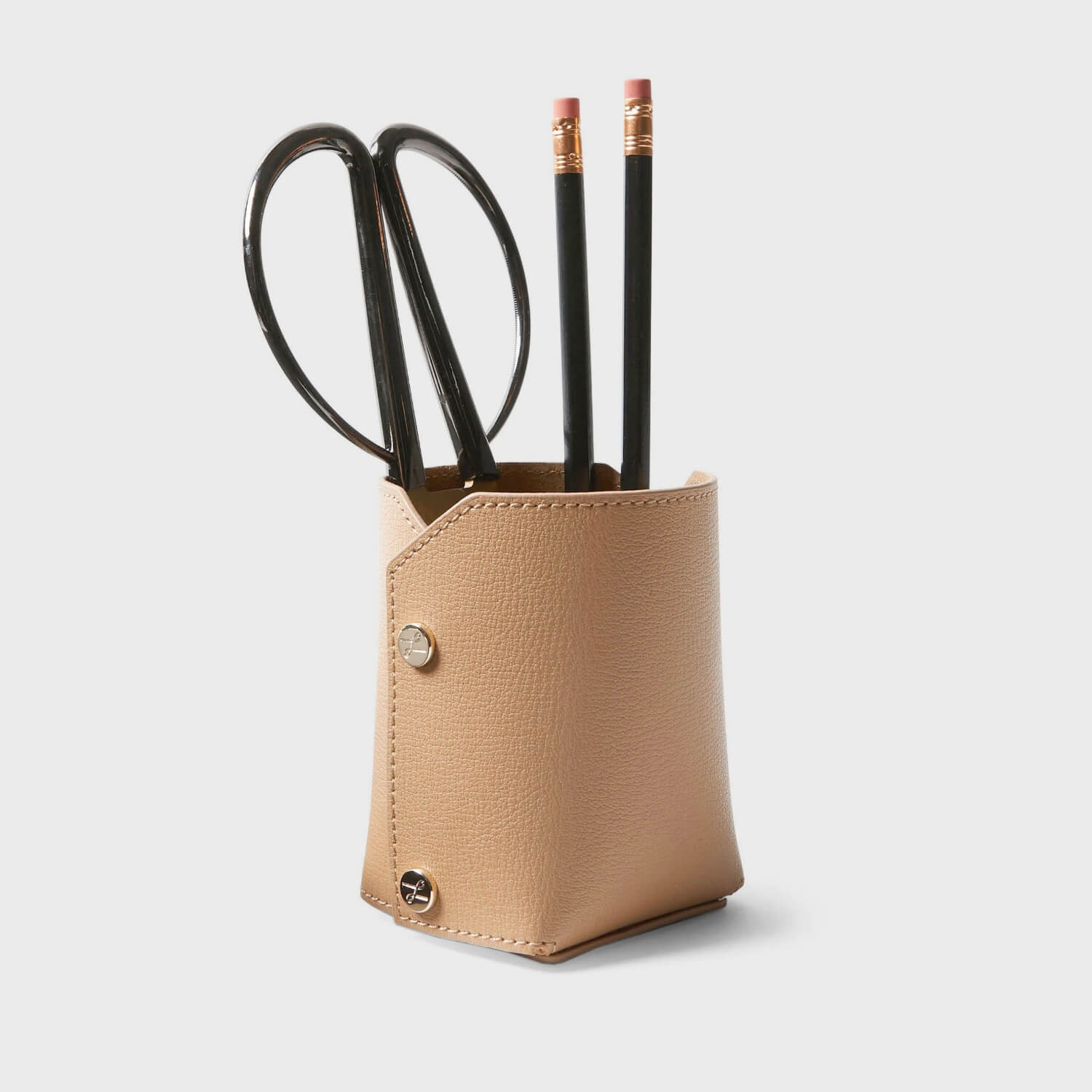 Leatherology modern pencil cup with scissors and pencils, showcasing a stylish and functional workspace accessory.