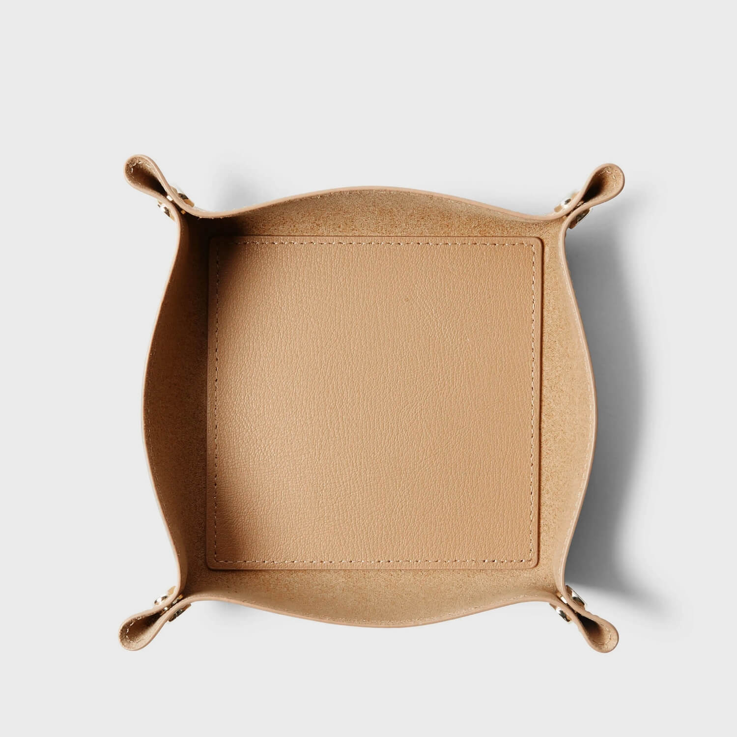 Top view of a Modern Valet Tray in soft leather, designed for organizing everyday essentials.