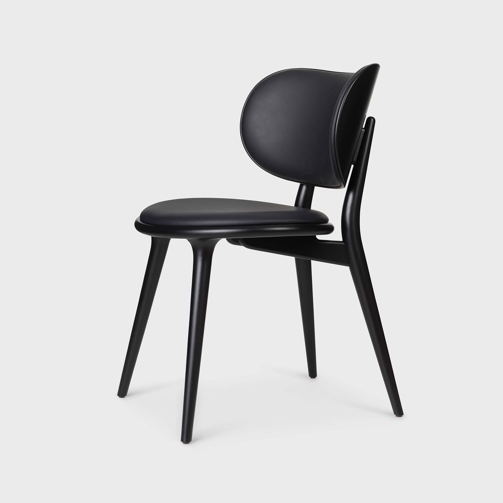 Side-angle view of Mater dining chair