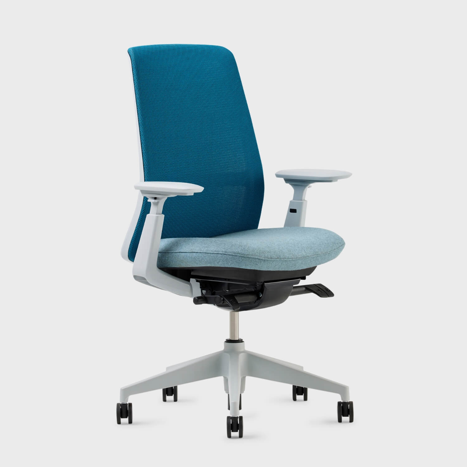 Soji Office Chair in teal mesh with plush seat, designed for comfort and ergonomic support in modern workspaces.